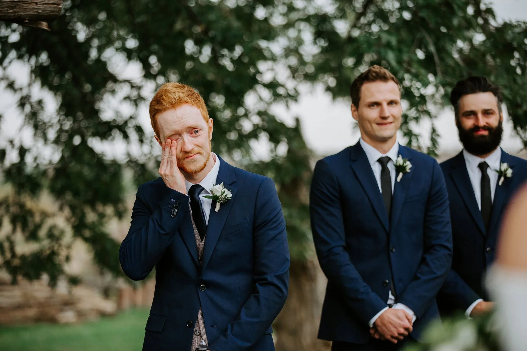 Emotion at wedding photos by Joey Rudd