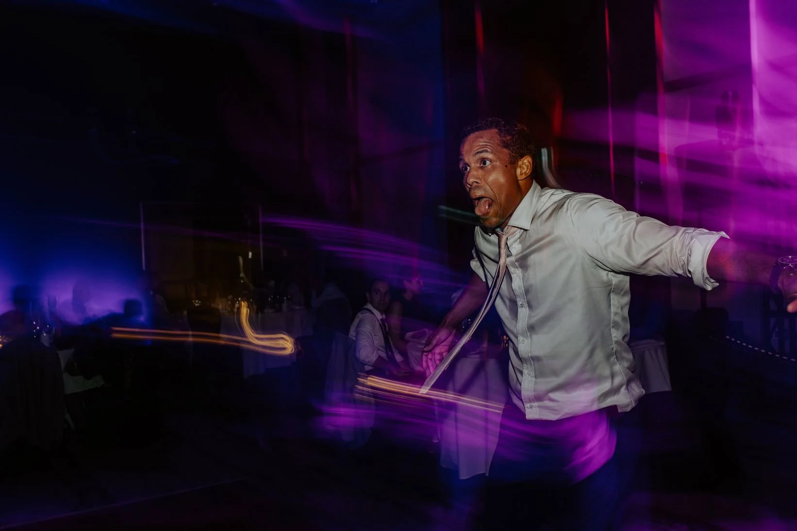 Candid reception photos by wedding photographer Joey Rudd