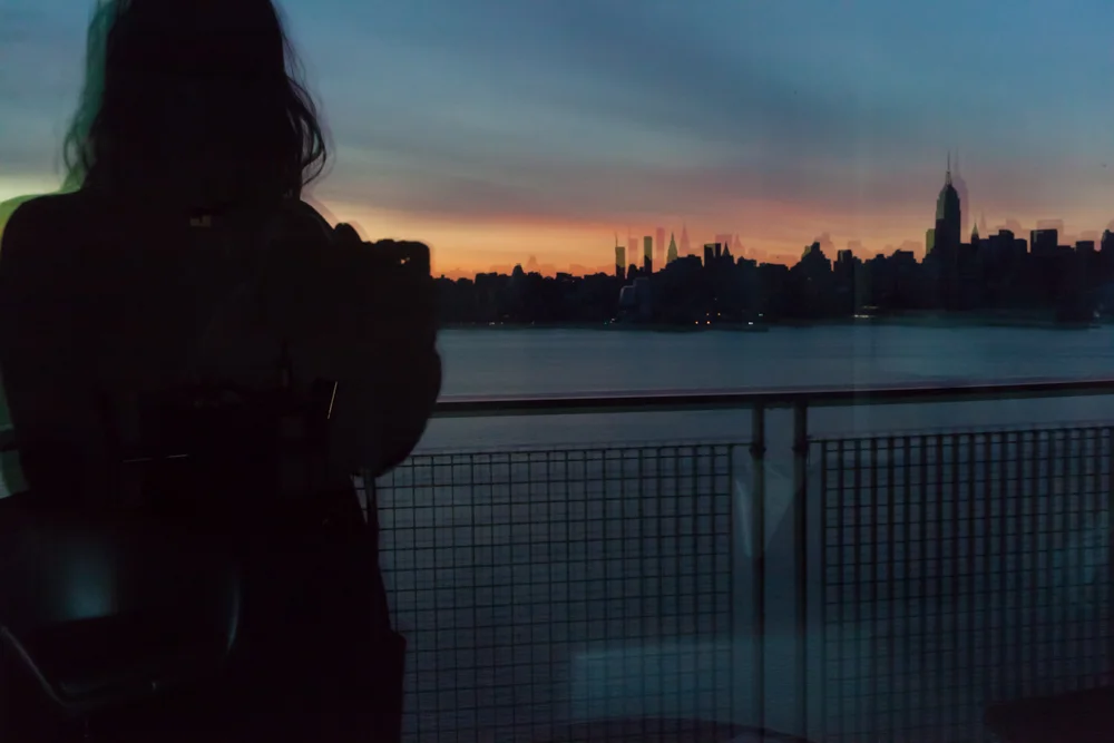 My reflection against NYC's skyline