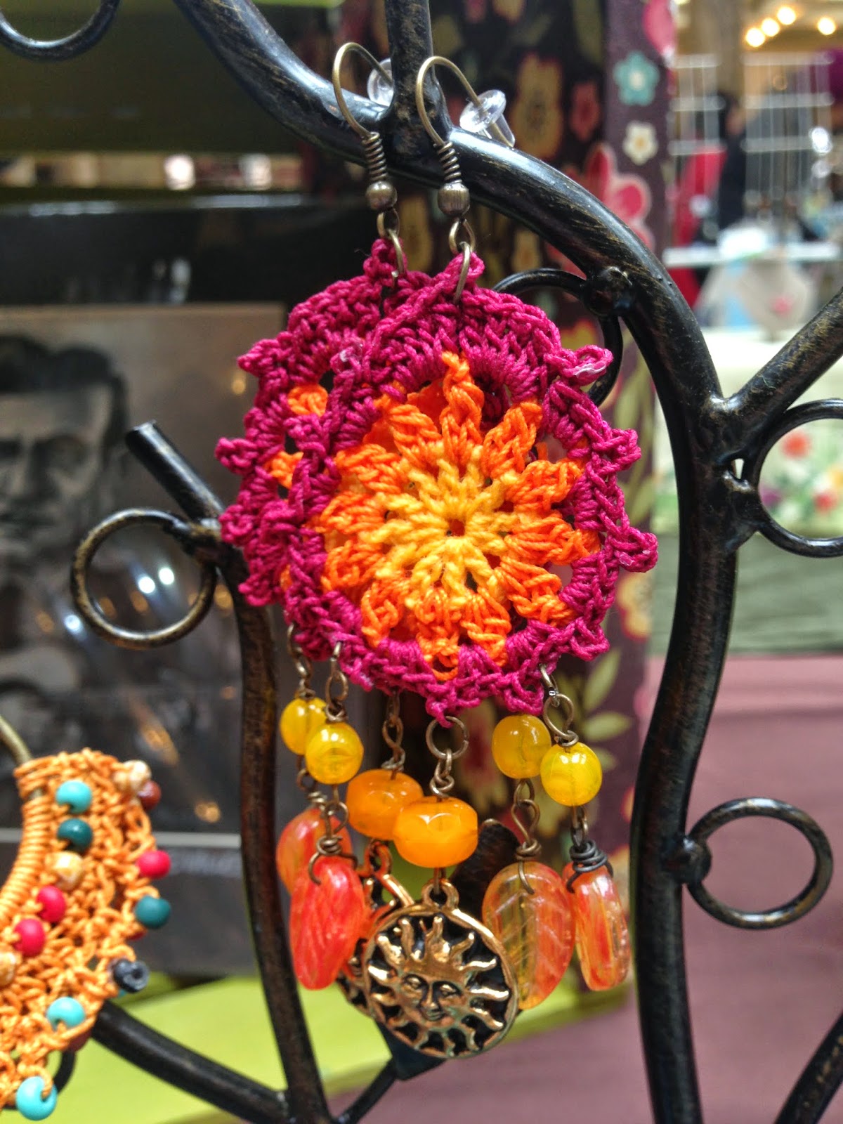 Crochet Earrings with brass sun charm and czech glass beading $24