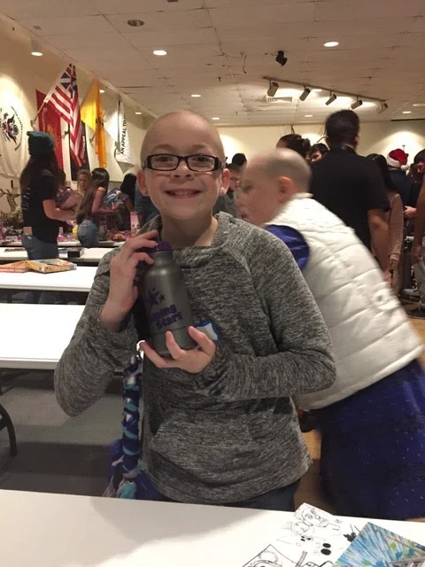 Ali at the annual Shining Stars holiday party and toy giveaway!