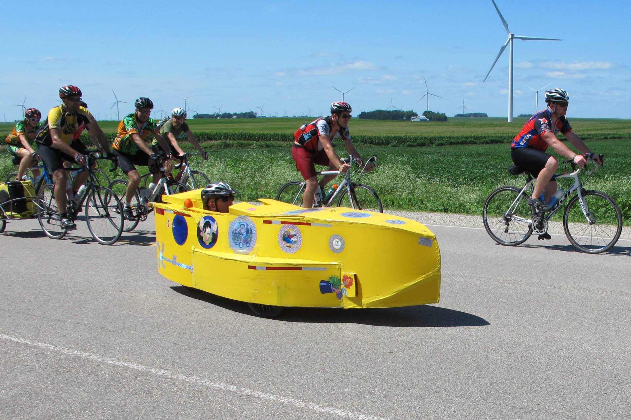 Yes, that is a pedal-powered Yellow Submarine with onboard speakers playing Beatles' hits.