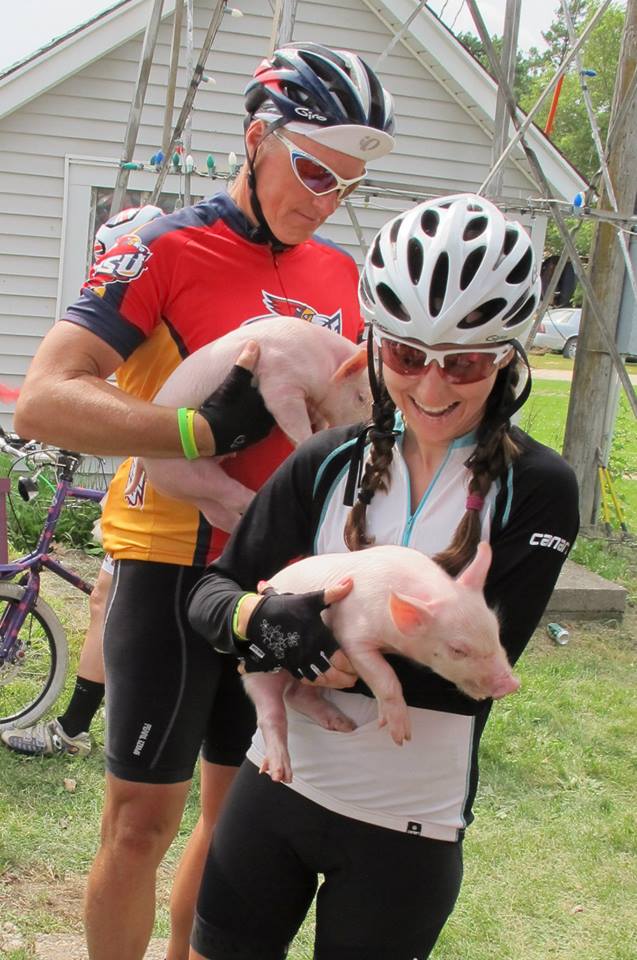 RAGBRAI - where you can cuddle a piglet in the morning and enjoy lunch twenty miles later at Mr. Pork Chop.