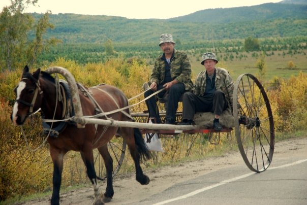 Modes of transport traditional and modern use the Siberian roads.