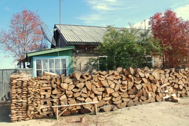 The beginning of the firewood supply for upcoming winter warmth.