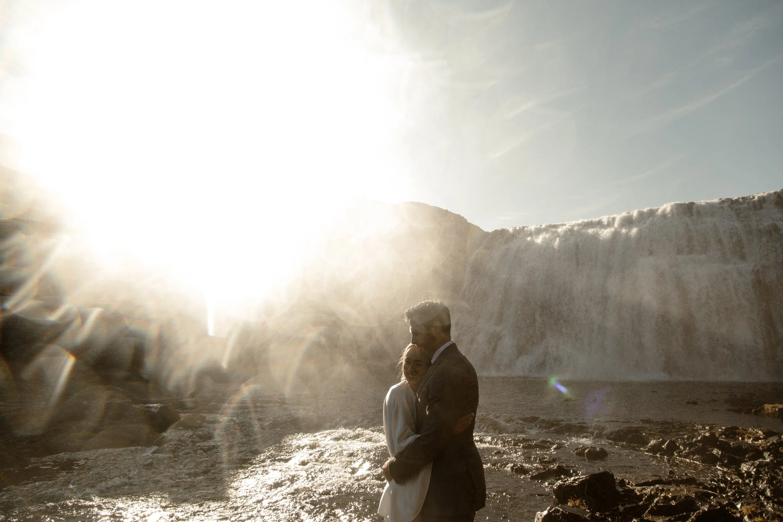 iceland engagement photos at waterfall