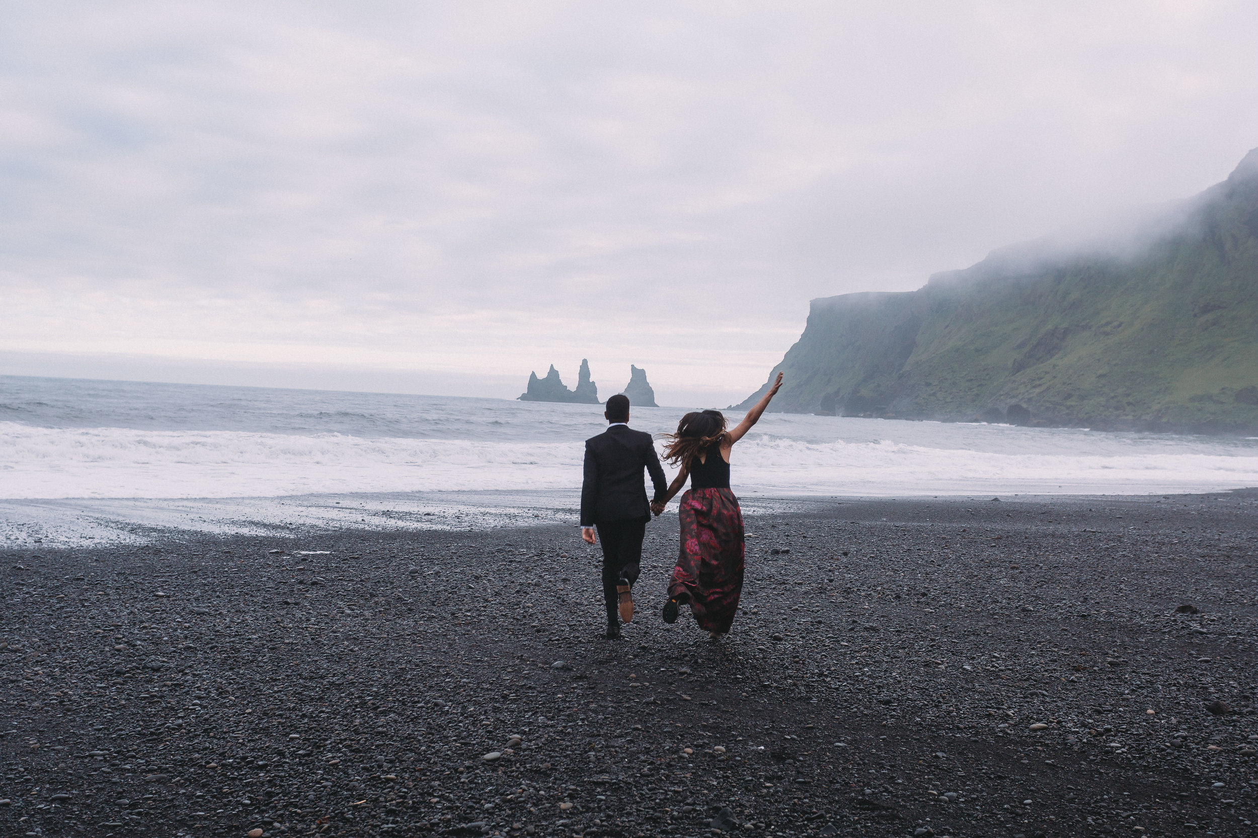 Iceland elopement photographer | Iceland south coast engagement photos | Iceland black sand beach wedding pictures