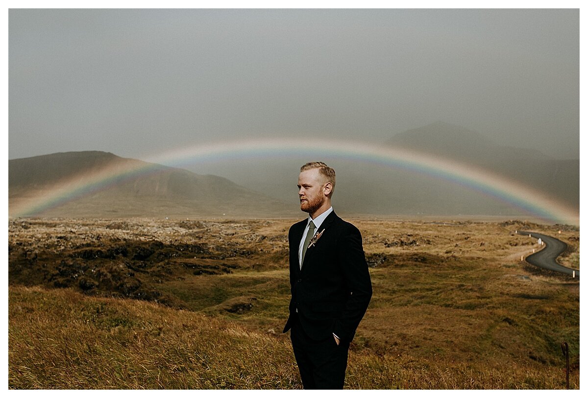 best photos of Budir black church Iceland groom walking to ceremony