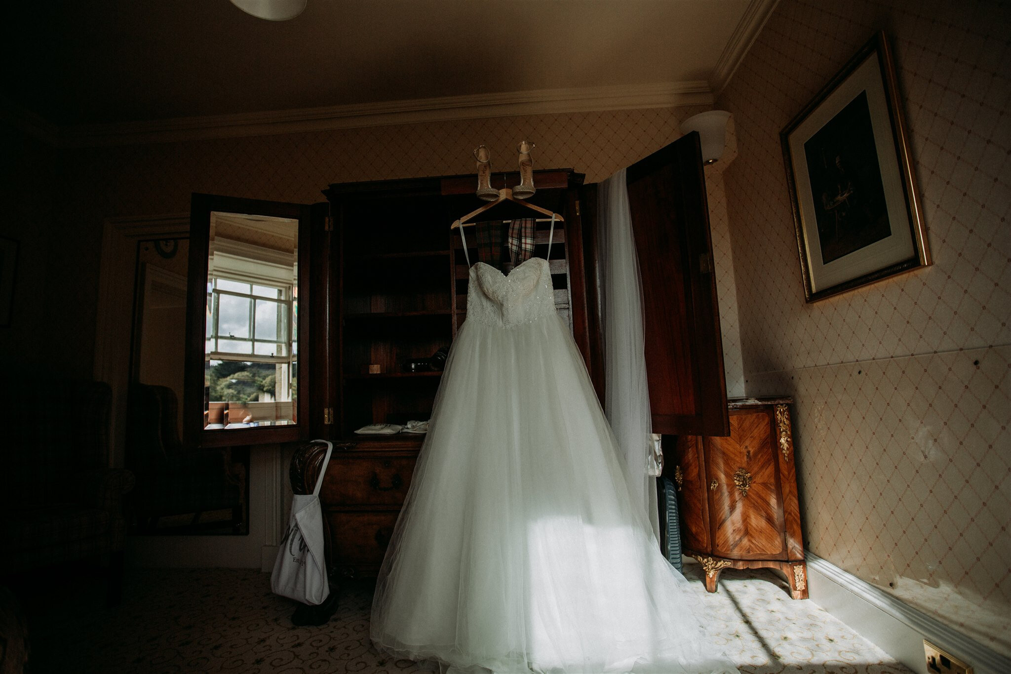 Culzean Castle Scotland elopement wedding dress hanging in castle | adventure elopement photographer