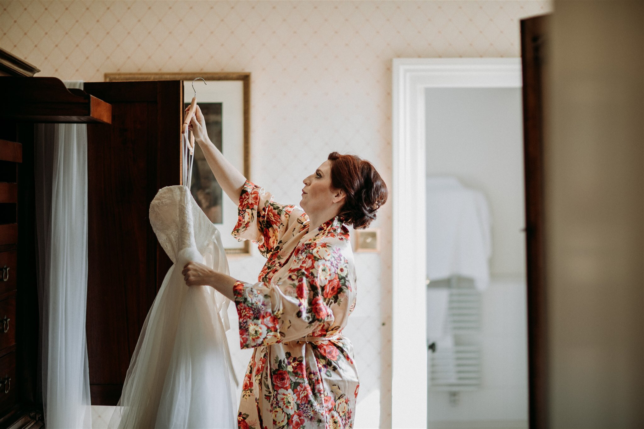 Culzean Castle Scotland elopement bride getting into her dress | adventure elopement photographer