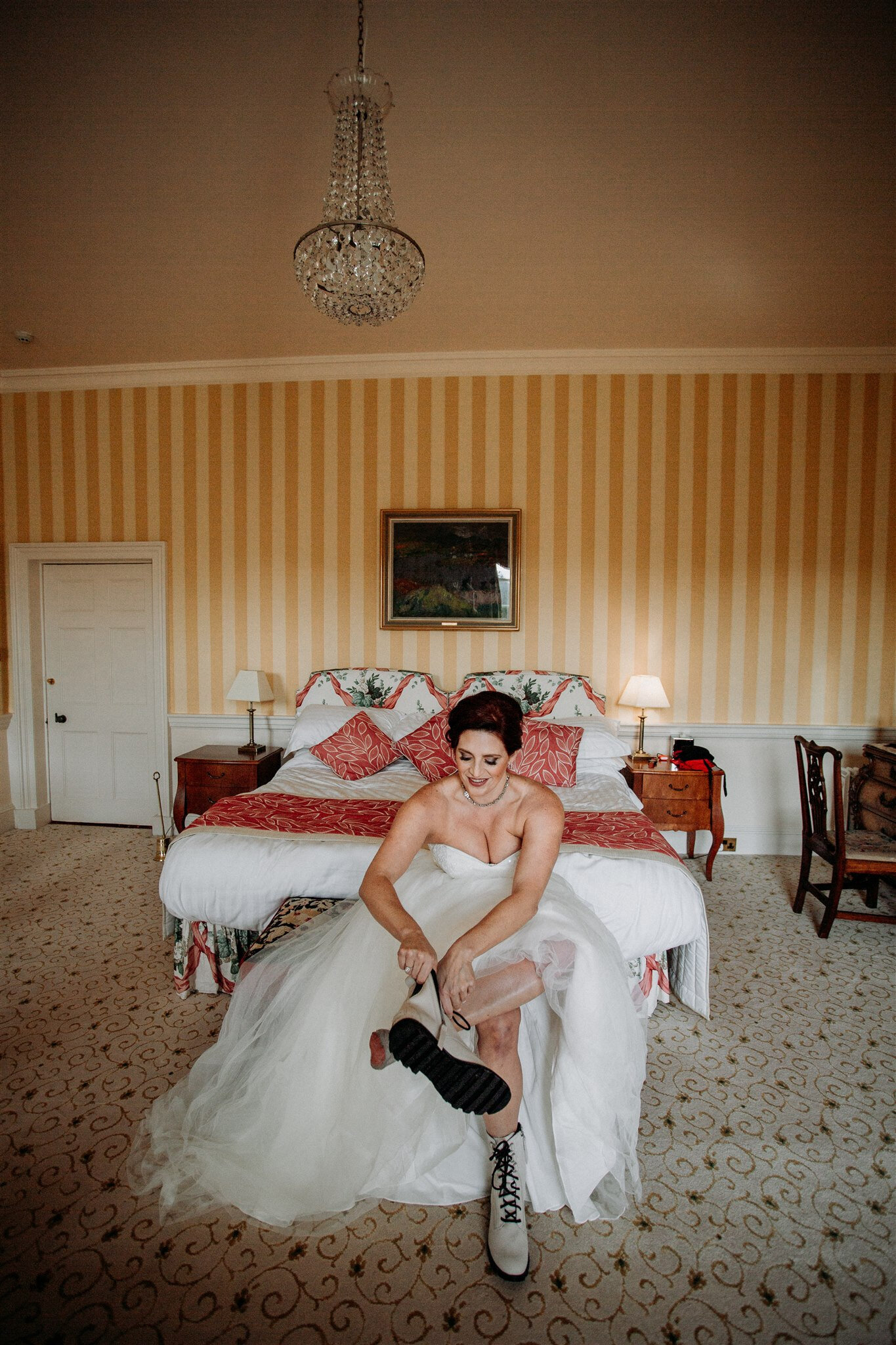 Culzean Castle Scotland elopement bride getting into her dress | adventure elopement photographer