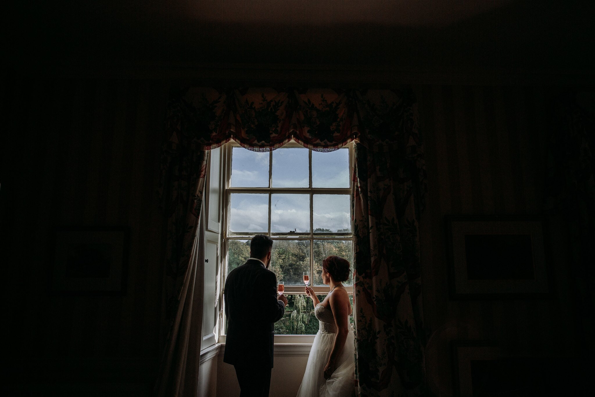 Culzean Castle Scotland elopement bride and groom in a castle window | adventure elopement photographer