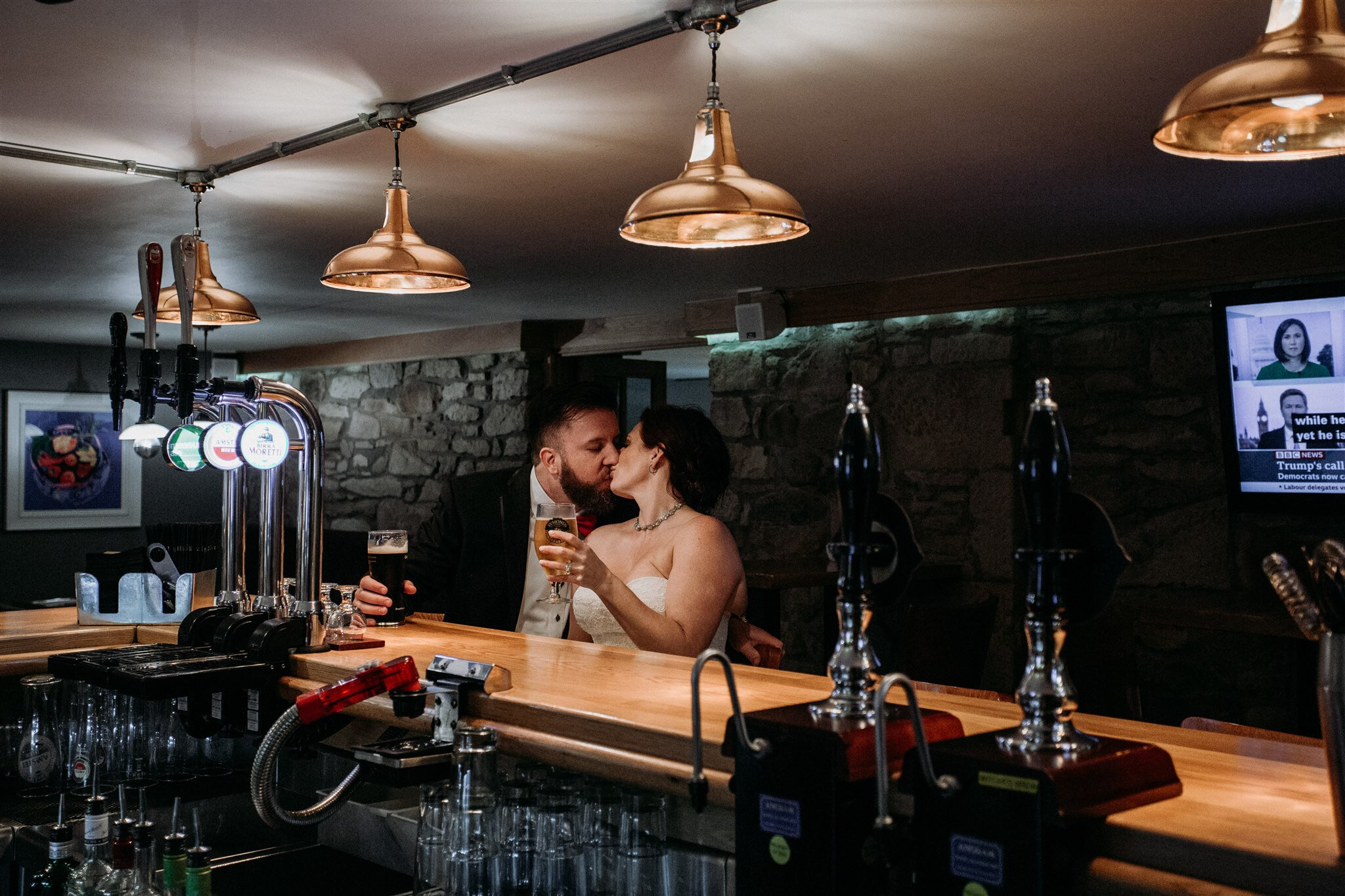 Culzean Castle Scotland elopement bride and groom kiss in a pub | adventure elopement photographer