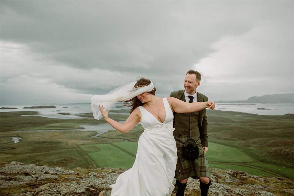 Having fun with the elements on your elopement.jpg