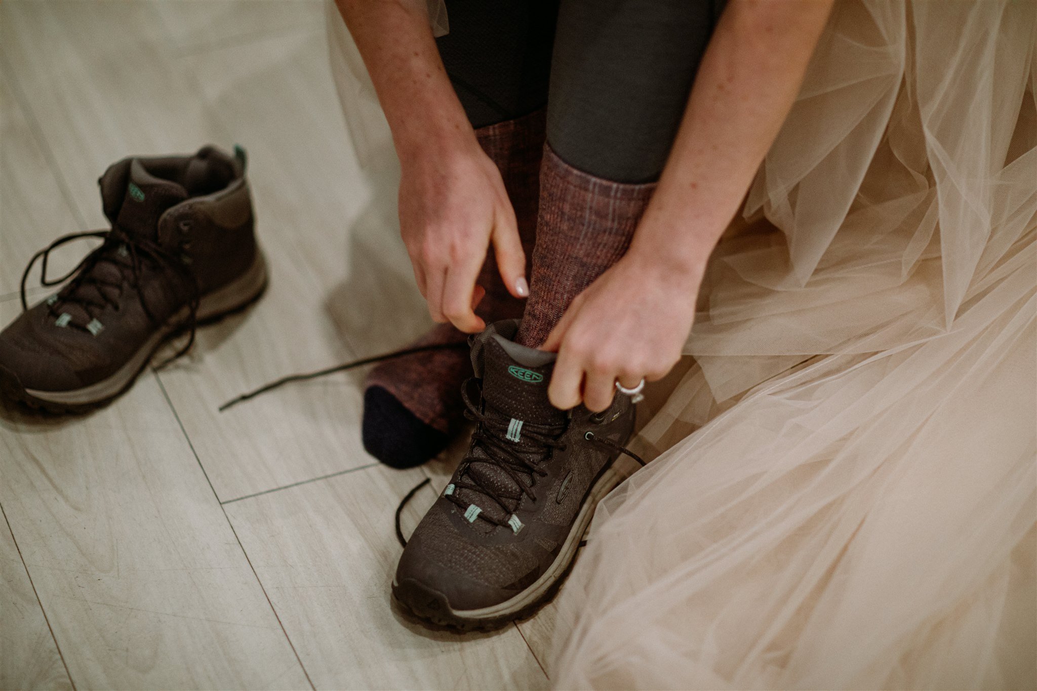 Iceland Elopement getting ready photo of bride and hiking boots by Iceland elopement photographer &amp; planner