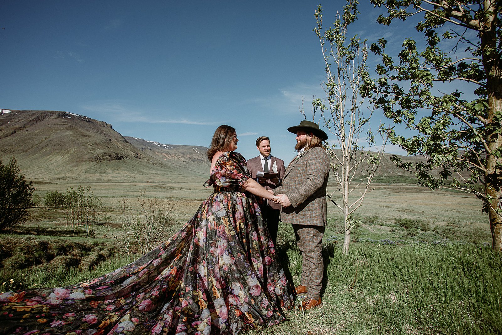 private Iceland elopement in black wedding dress couple at ceremony
