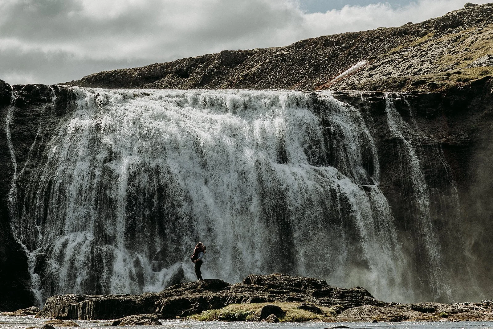 private Iceland proposal at waterfall  hike down to waterfall