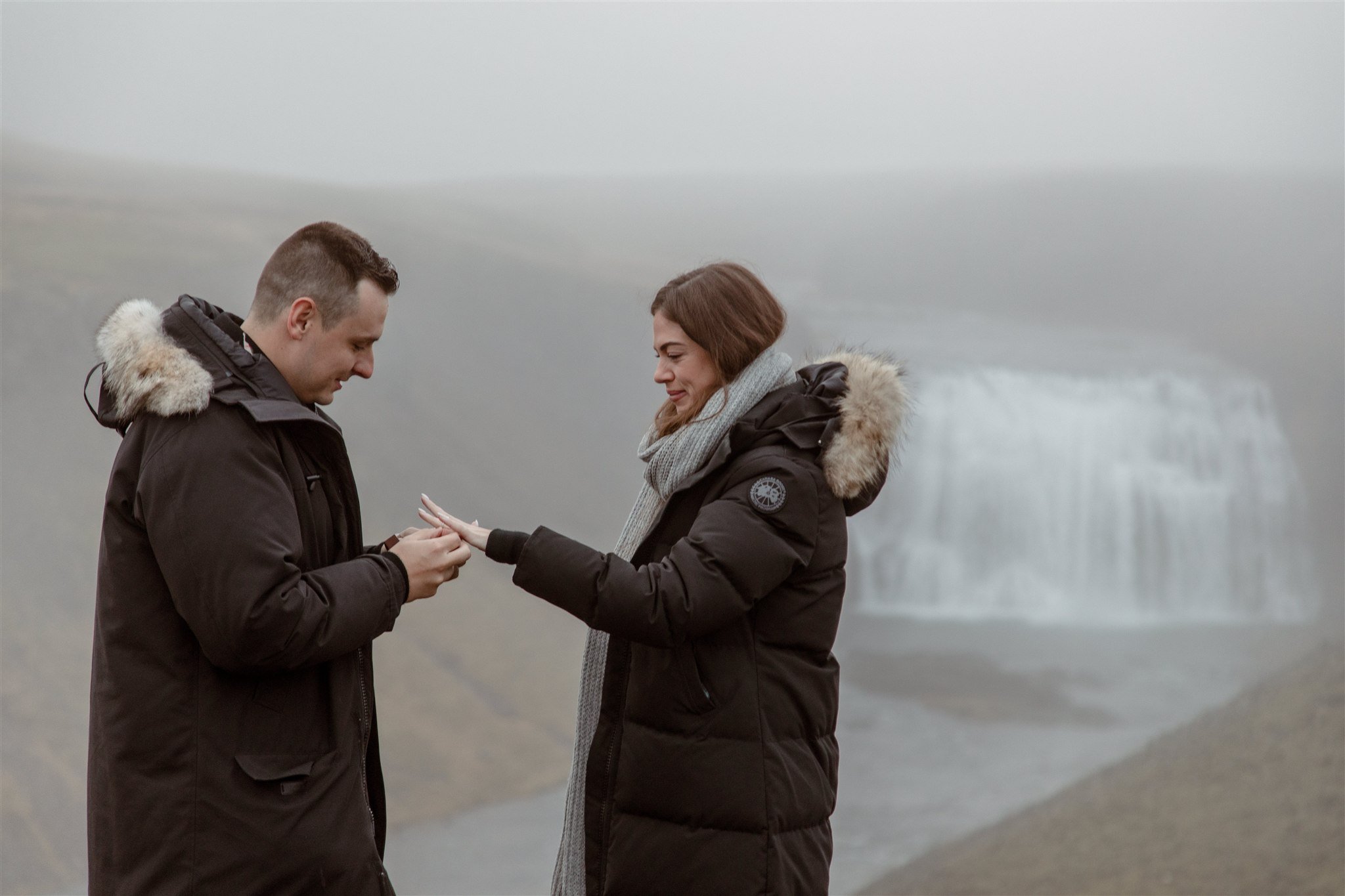 A Secret Iceland Proposal at a Foggy Winter Waterfall
