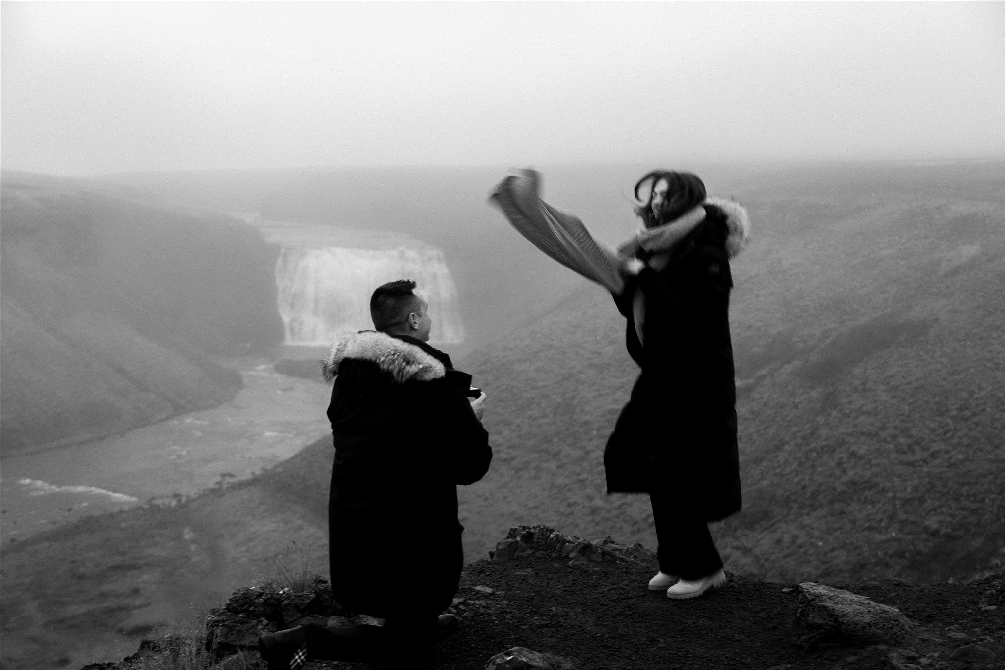  Secret Iceland Proposal at a Foggy Winter Waterfall by a local Iceland Engagement &amp; Proposal Photographer and planner — the proposal moment excitement  