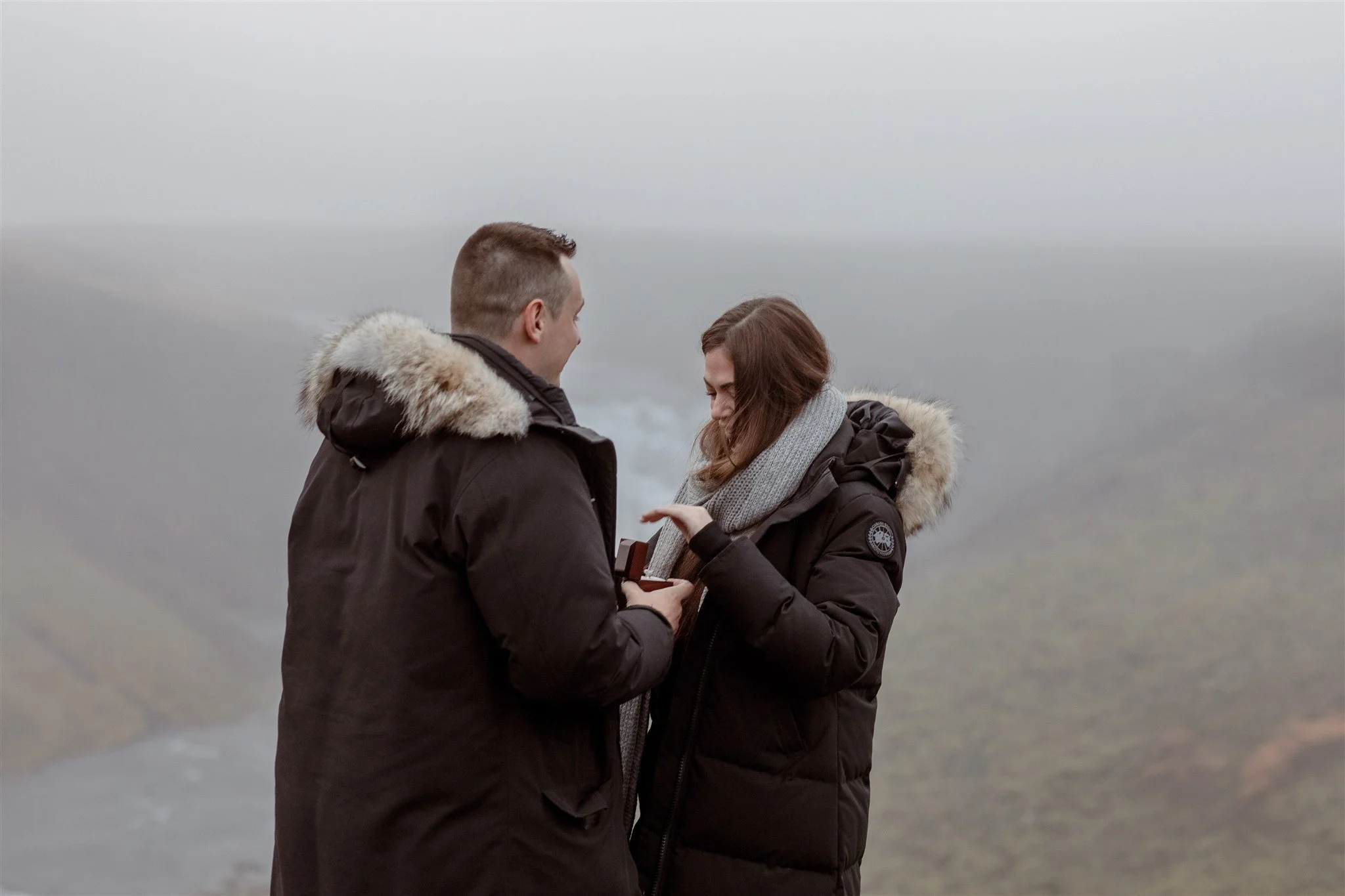  Secret Iceland Proposal at a Foggy Winter Waterfall by a local Iceland Engagement &amp; Proposal Photographer and planner —she said yes 
