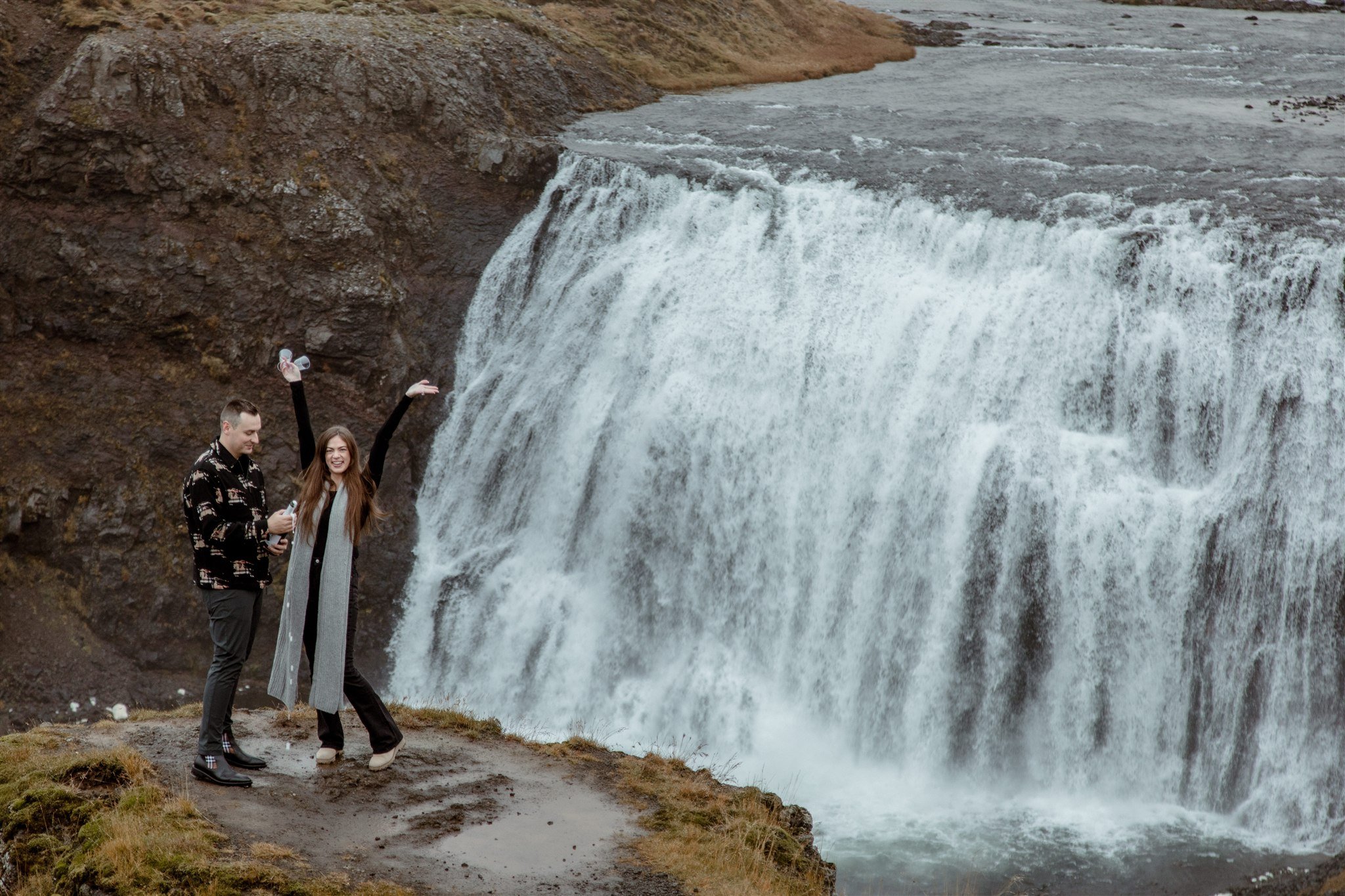  Secret Iceland Proposal at a Foggy Winter Waterfall by a local Iceland Engagement &amp; Proposal Photographer and planner —couple at waterfall 