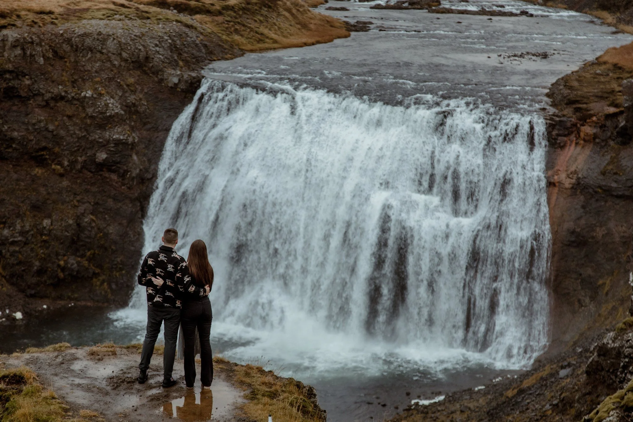  Secret Iceland Proposal at a Foggy Winter Waterfall by a local Iceland Engagement &amp; Proposal Photographer and planner —couple at waterfall 