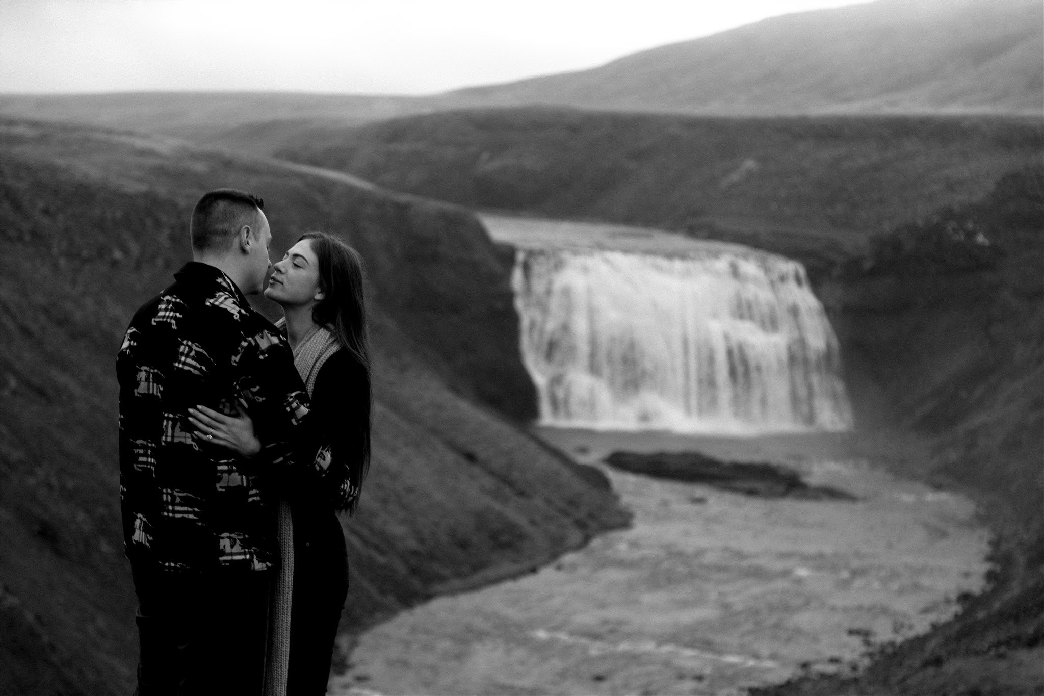  Secret Iceland Proposal at a Foggy Winter Waterfall by a local Iceland Engagement &amp; Proposal Photographer and planner —couple at waterfall 