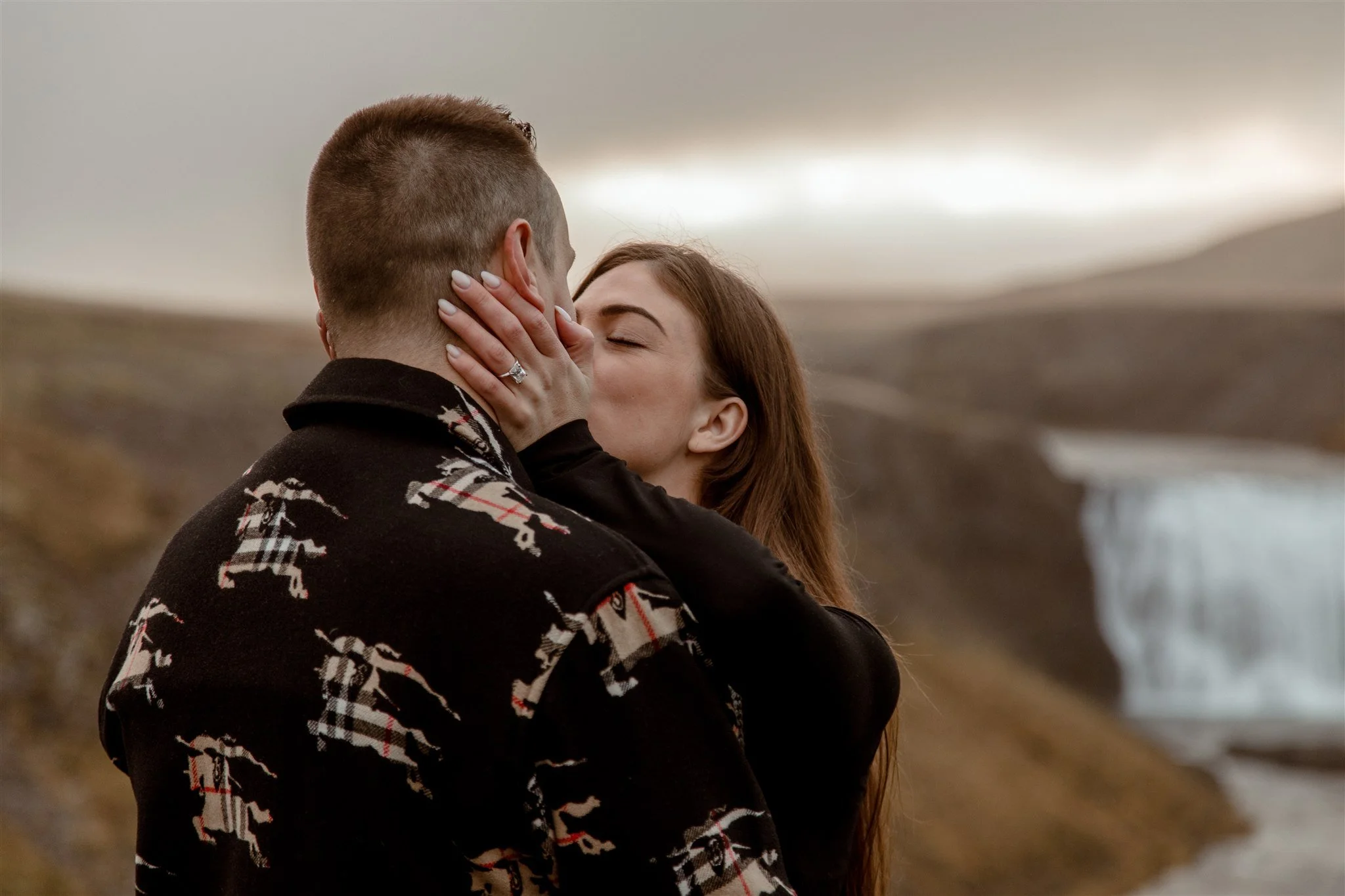  Secret Iceland Proposal at a Foggy Winter Waterfall by a local Iceland Engagement &amp; Proposal Photographer and planner —couple at waterfall 