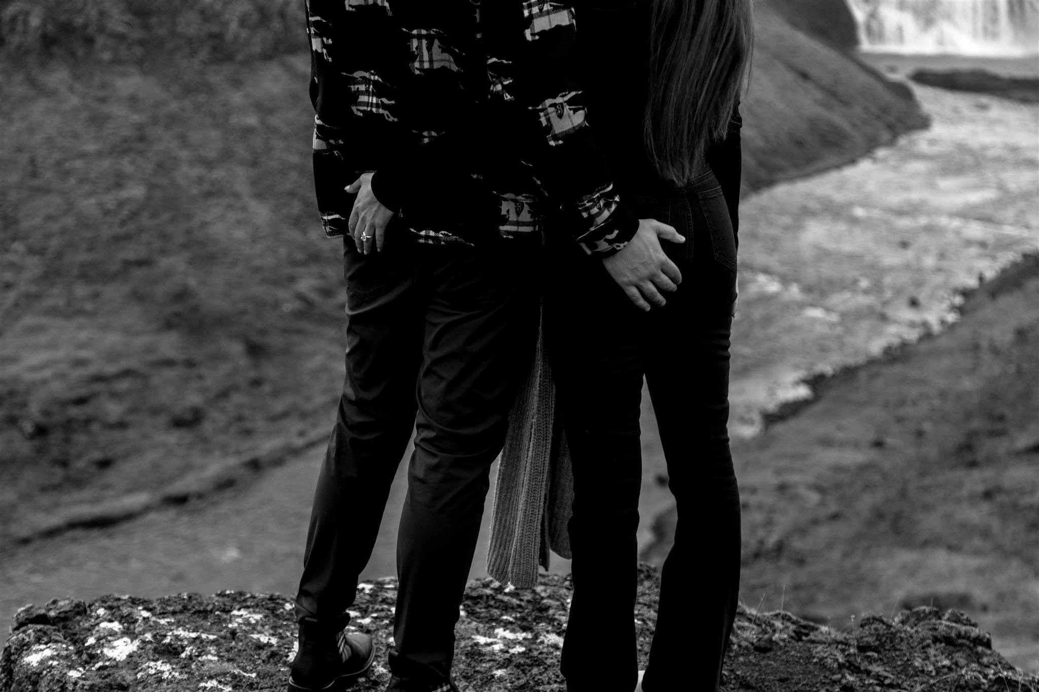  Secret Iceland Proposal at a Foggy Winter Waterfall by a local Iceland Engagement &amp; Proposal Photographer and planner —couple at waterfall 