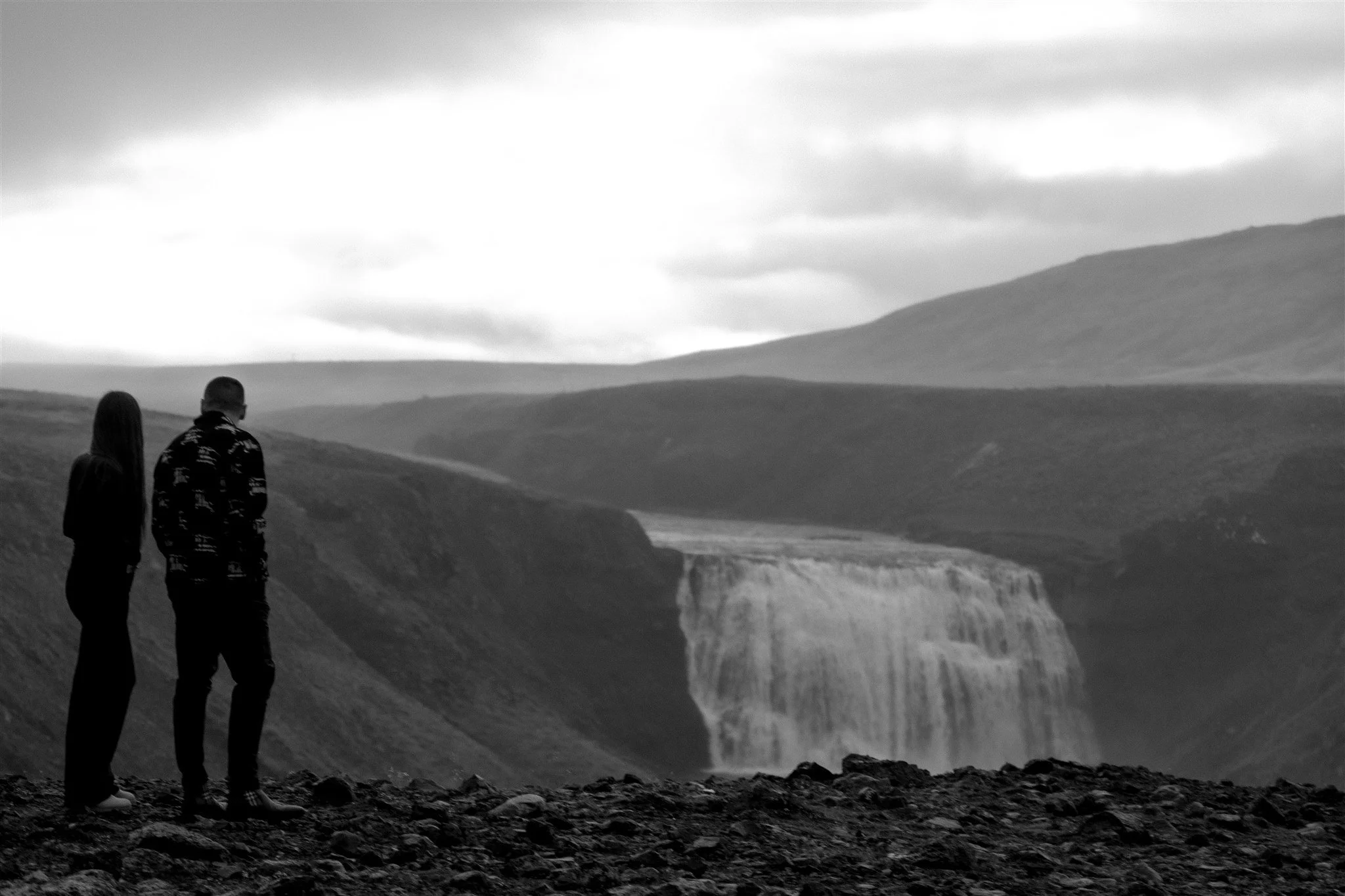 Secret Iceland Proposal at a Foggy Winter Waterfall by a local Iceland Engagement &amp; Proposal Photographer and planner —couple at waterfall 