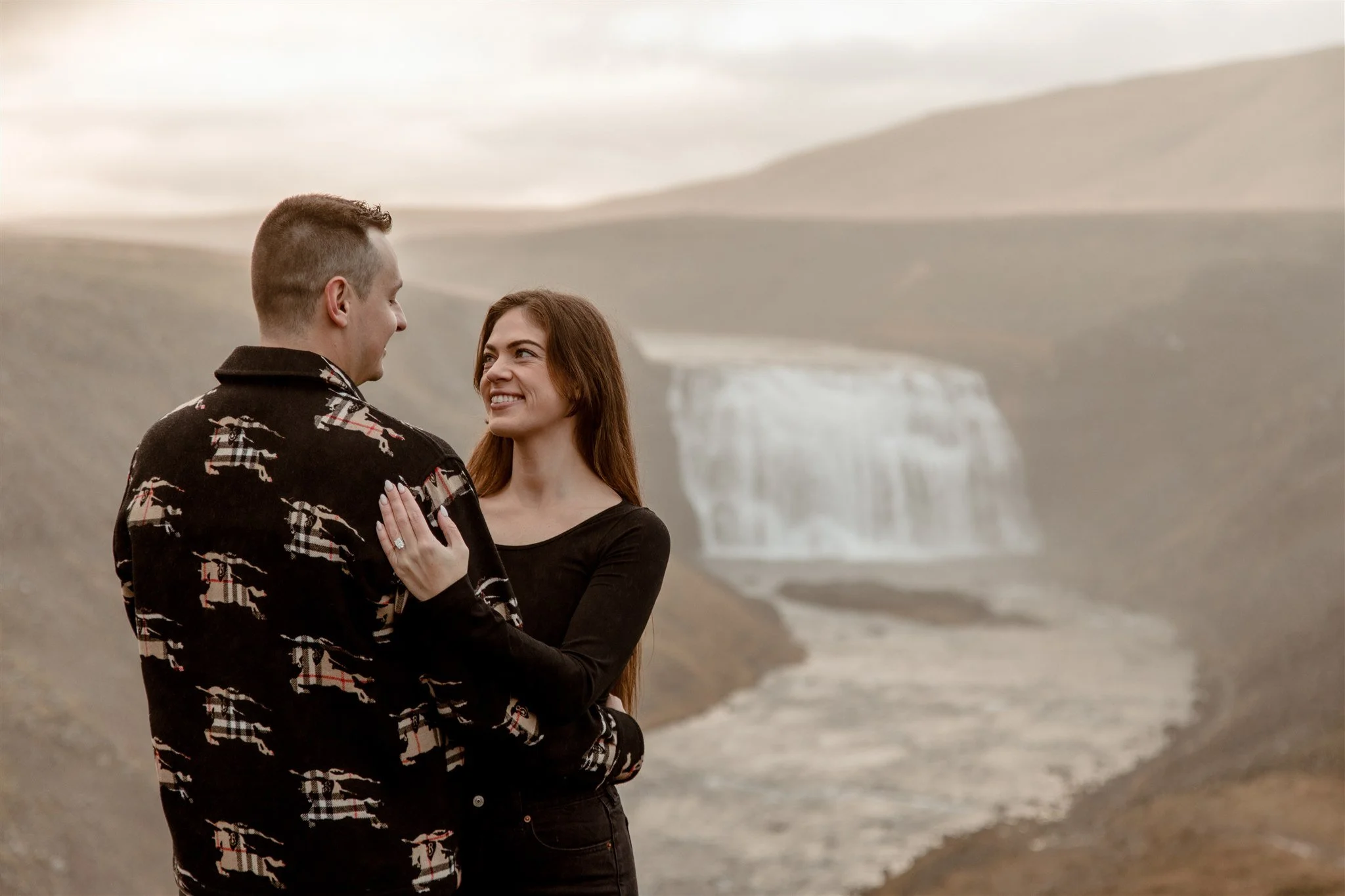  Secret Iceland Proposal at a Foggy Winter Waterfall by a local Iceland Engagement &amp; Proposal Photographer and planner —couple at waterfall 