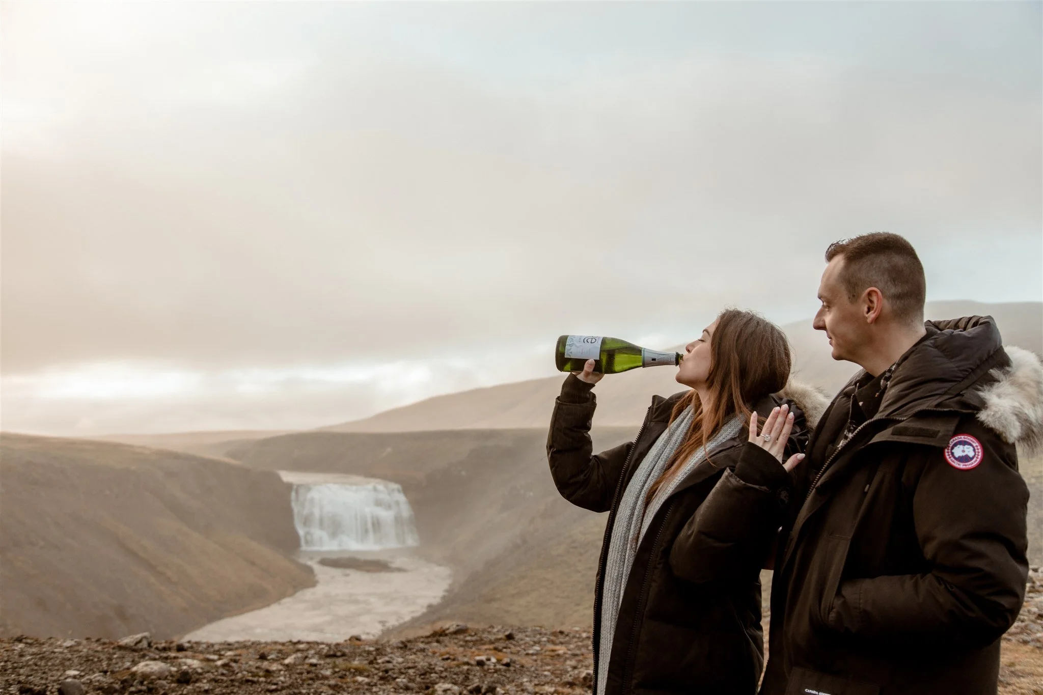  Secret Iceland Proposal at a Foggy Winter Waterfall by a local Iceland Engagement &amp; Proposal Photographer and planner —couple at waterfall 