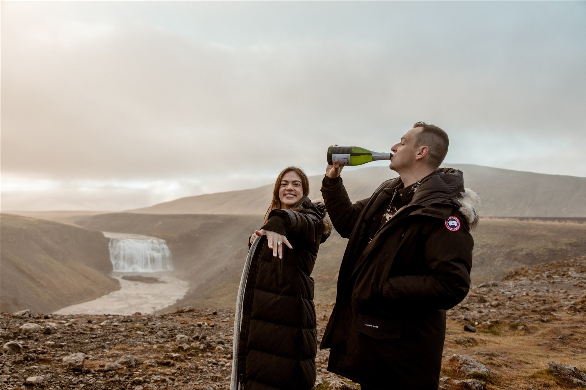  Secret Iceland Proposal at a Foggy Winter Waterfall by a local Iceland Engagement &amp; Proposal Photographer and planner —couple at waterfall 