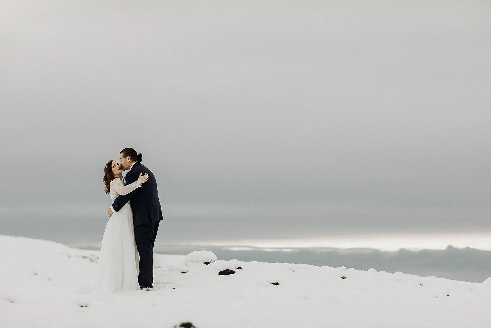 A Winter Iceland Elopement at Skógafoss (Skogafoss) and Glacier — couple at glacier