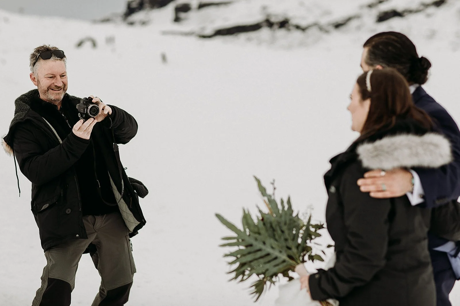 A Winter Iceland Elopement at Skógafoss (Skogafoss) and Glacier — couple at glacier