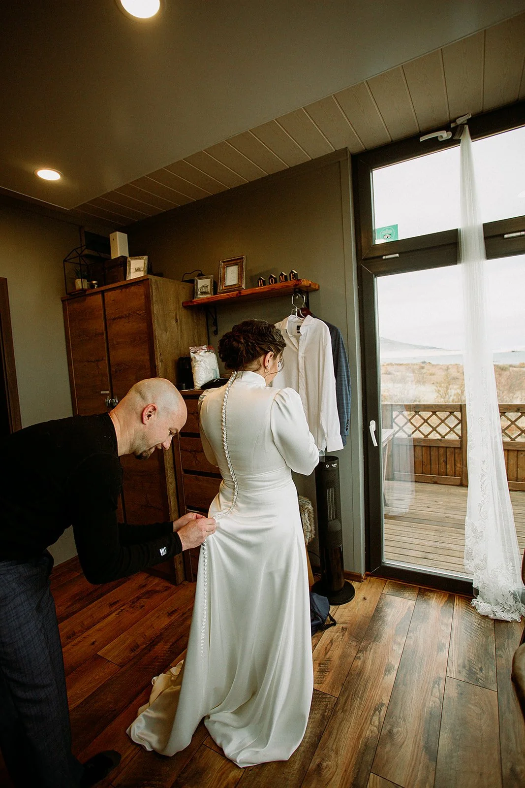 A Private Multi-Area Iceland Elopement with wedding details couple getting ready