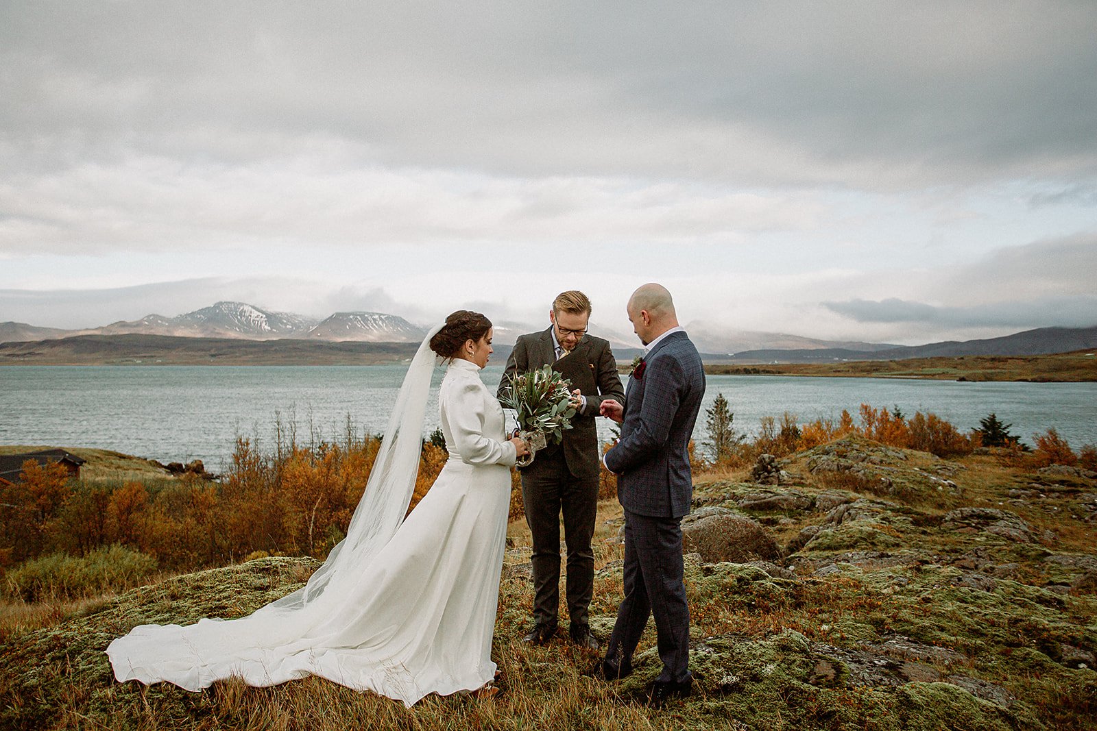 A Private Multi-Area Iceland Elopement by Steph Zakas Photography with wedding couple at private secluded ceremony