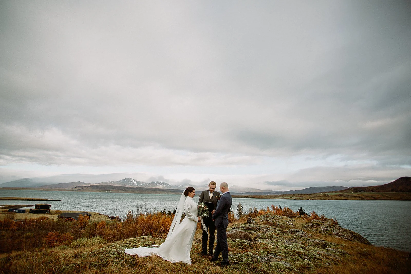 A Private Multi-Area Iceland Elopement by Steph Zakas Photography with wedding couple at private secluded ceremony