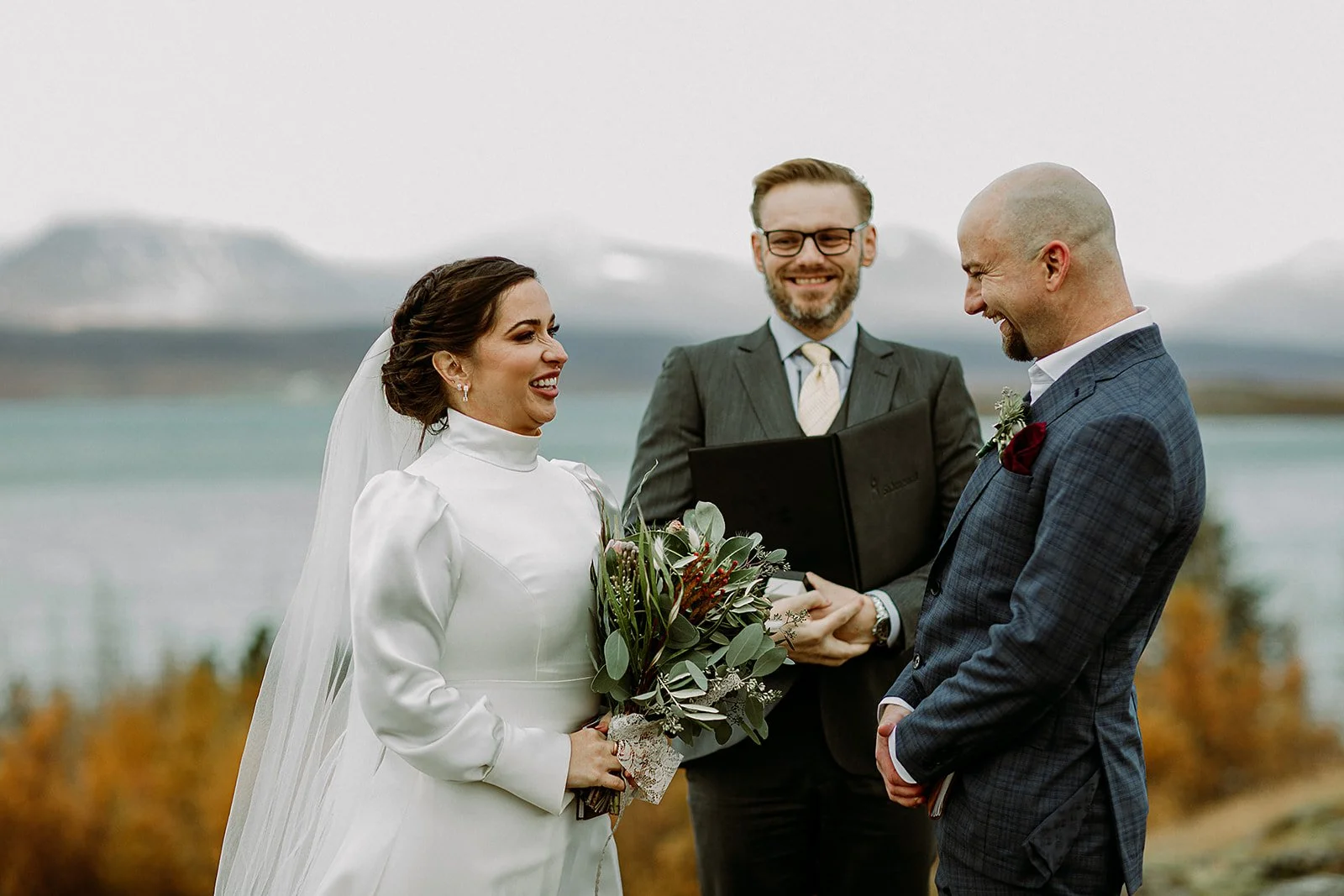 A Private Multi-Area Iceland Elopement by Steph Zakas Photography with wedding couple at private secluded ceremony