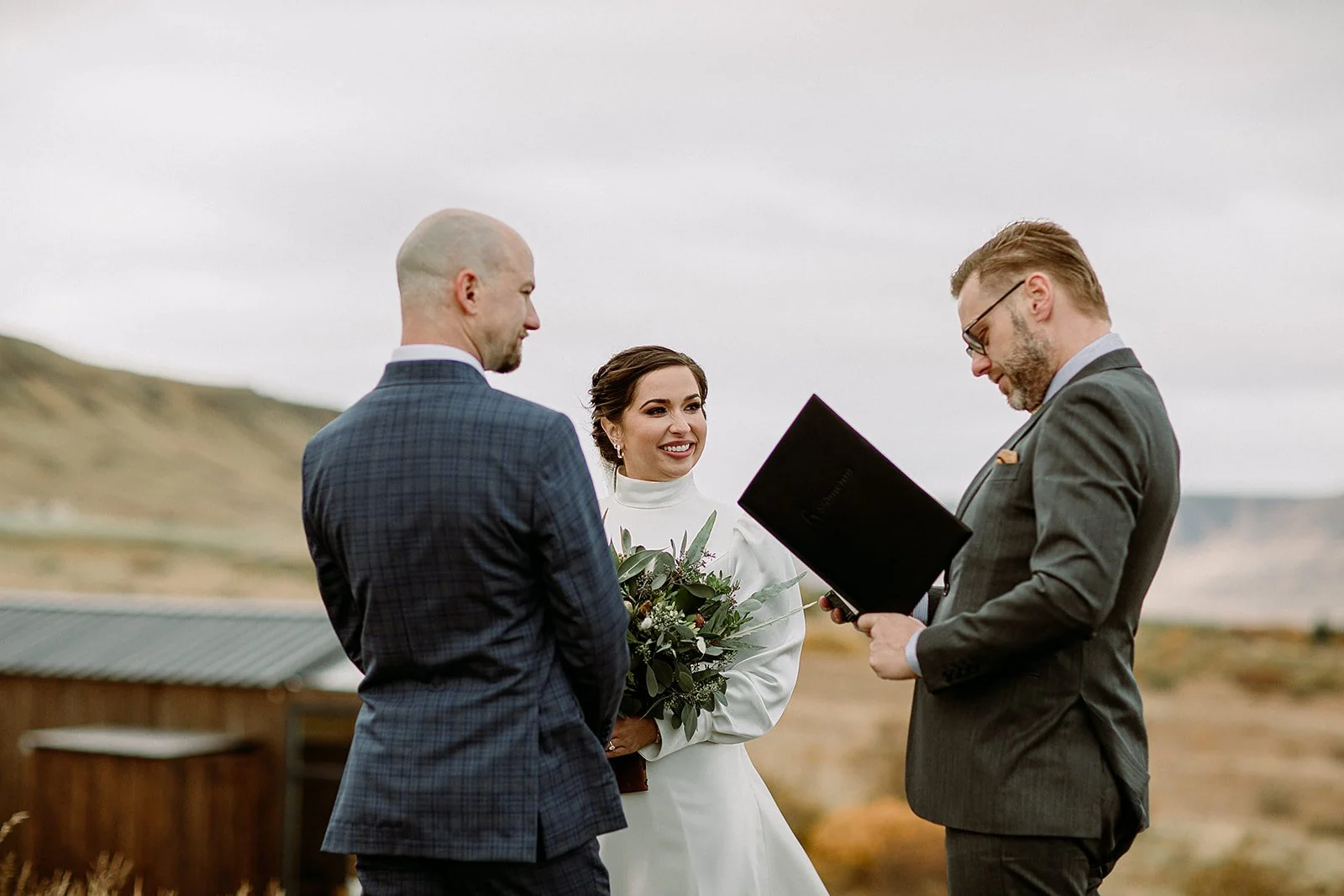 A Private Multi-Area Iceland Elopement by Steph Zakas Photography with wedding couple at private secluded ceremony
