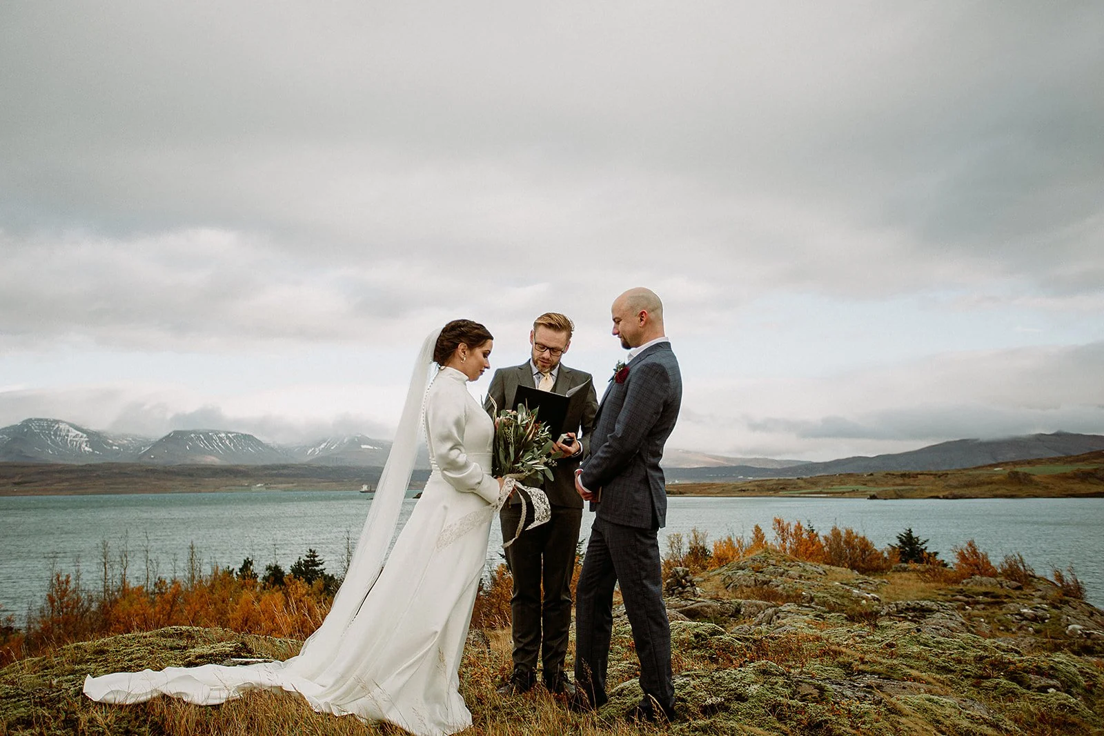 A Private Multi-Area Iceland Elopement by Steph Zakas Photography with wedding couple at private secluded ceremony