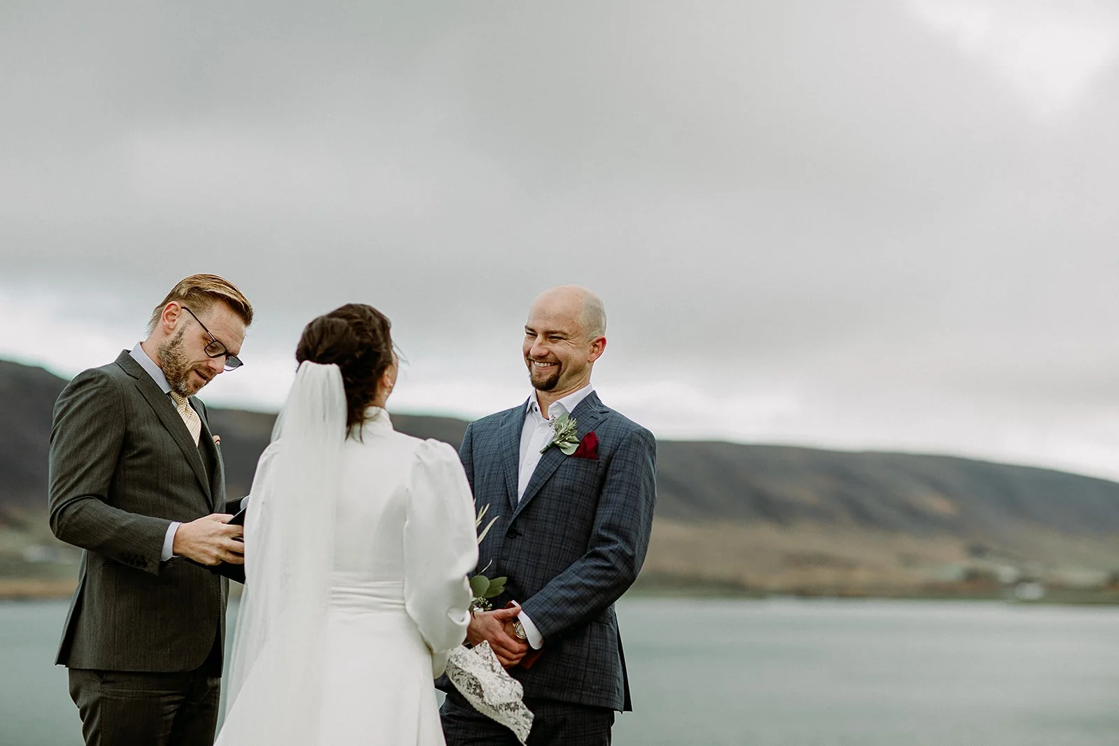 A Private Multi-Area Iceland Elopement by Steph Zakas Photography with wedding couple at private secluded ceremony