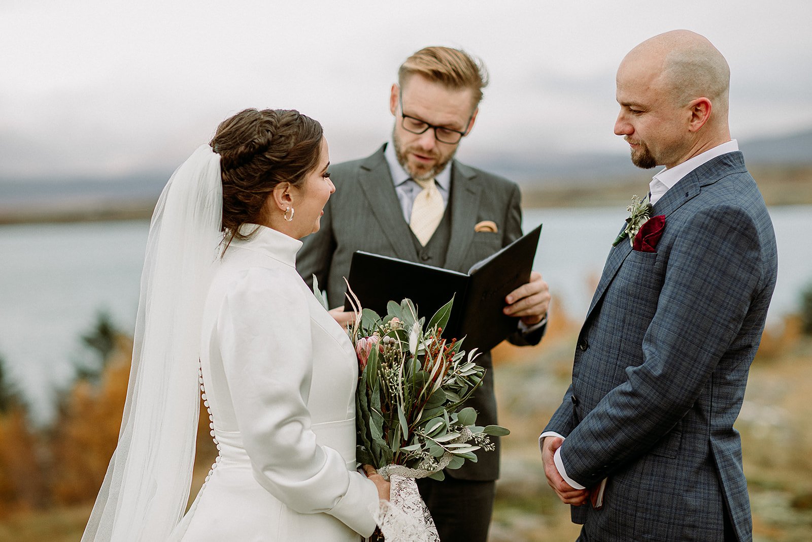 A Private Multi-Area Iceland Elopement by Steph Zakas Photography with wedding couple at private secluded ceremony