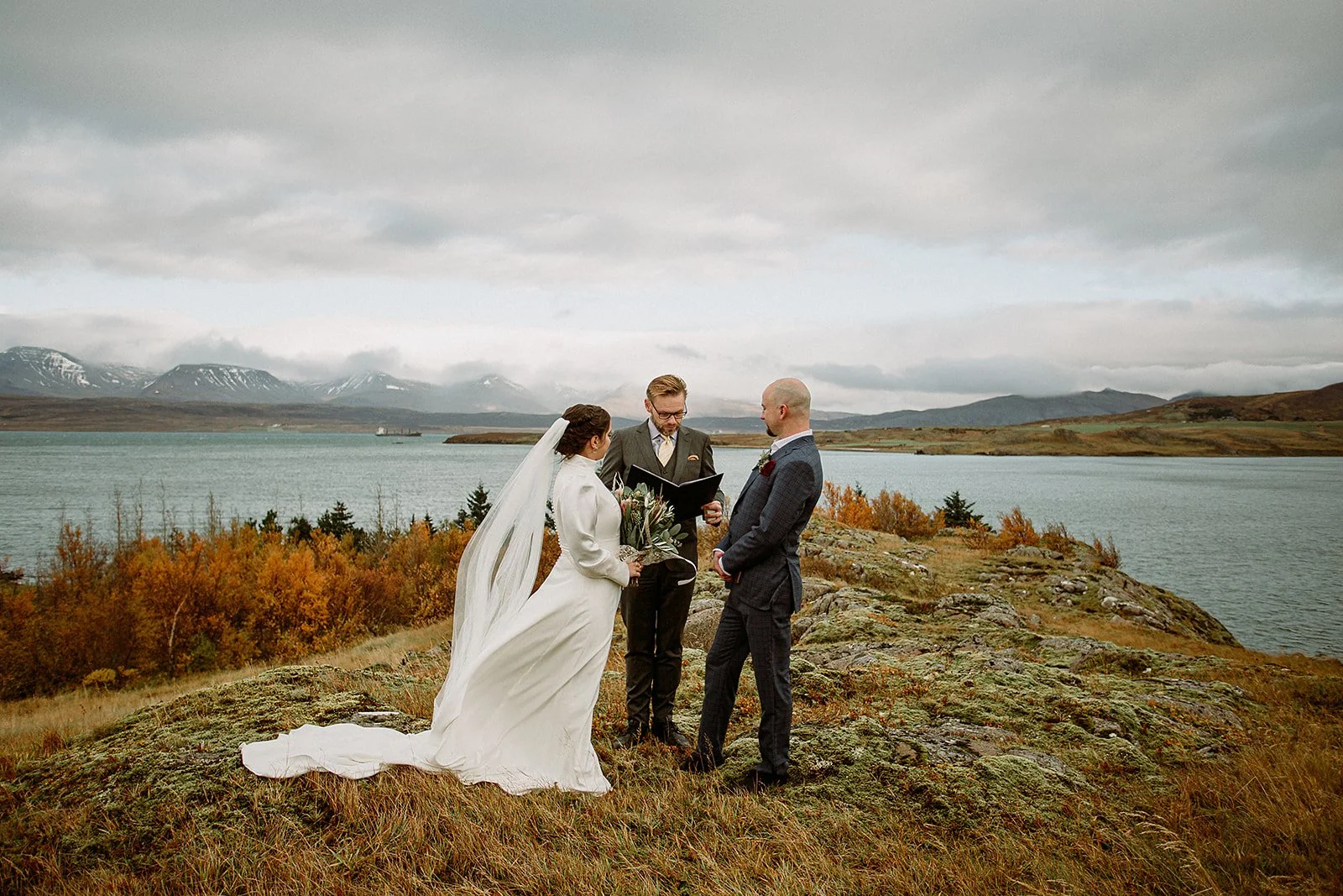 A Private Multi-Area Iceland Elopement by Steph Zakas Photography with wedding couple at private secluded ceremony