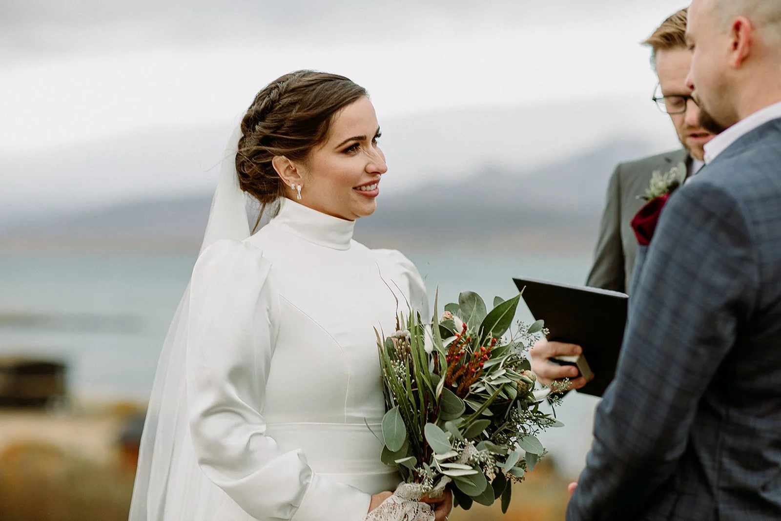 A Private Multi-Area Iceland Elopement by Steph Zakas Photography with wedding couple at private secluded ceremony