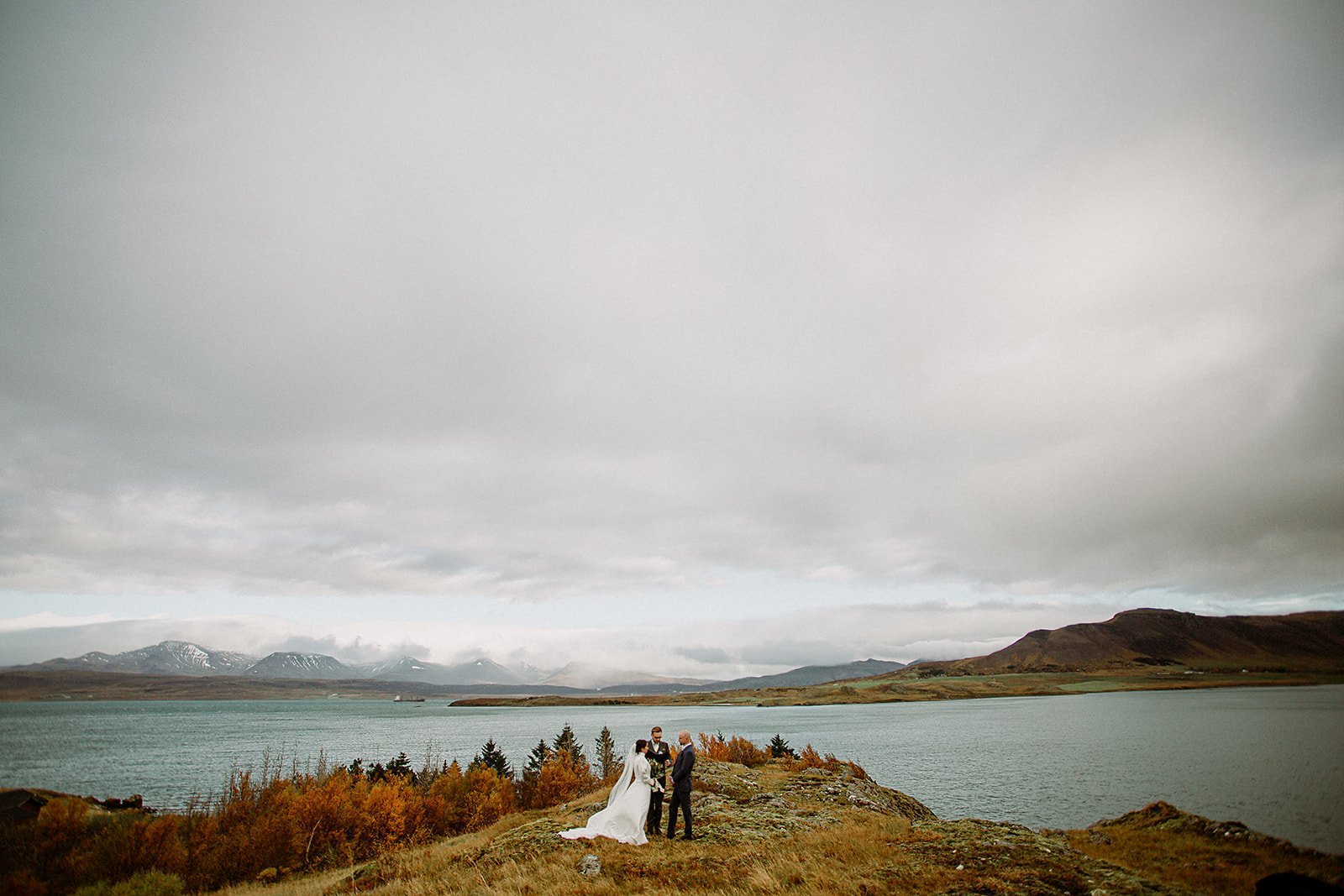 A Private Multi-Area Iceland Elopement by Steph Zakas Photography with wedding couple at private secluded ceremony
