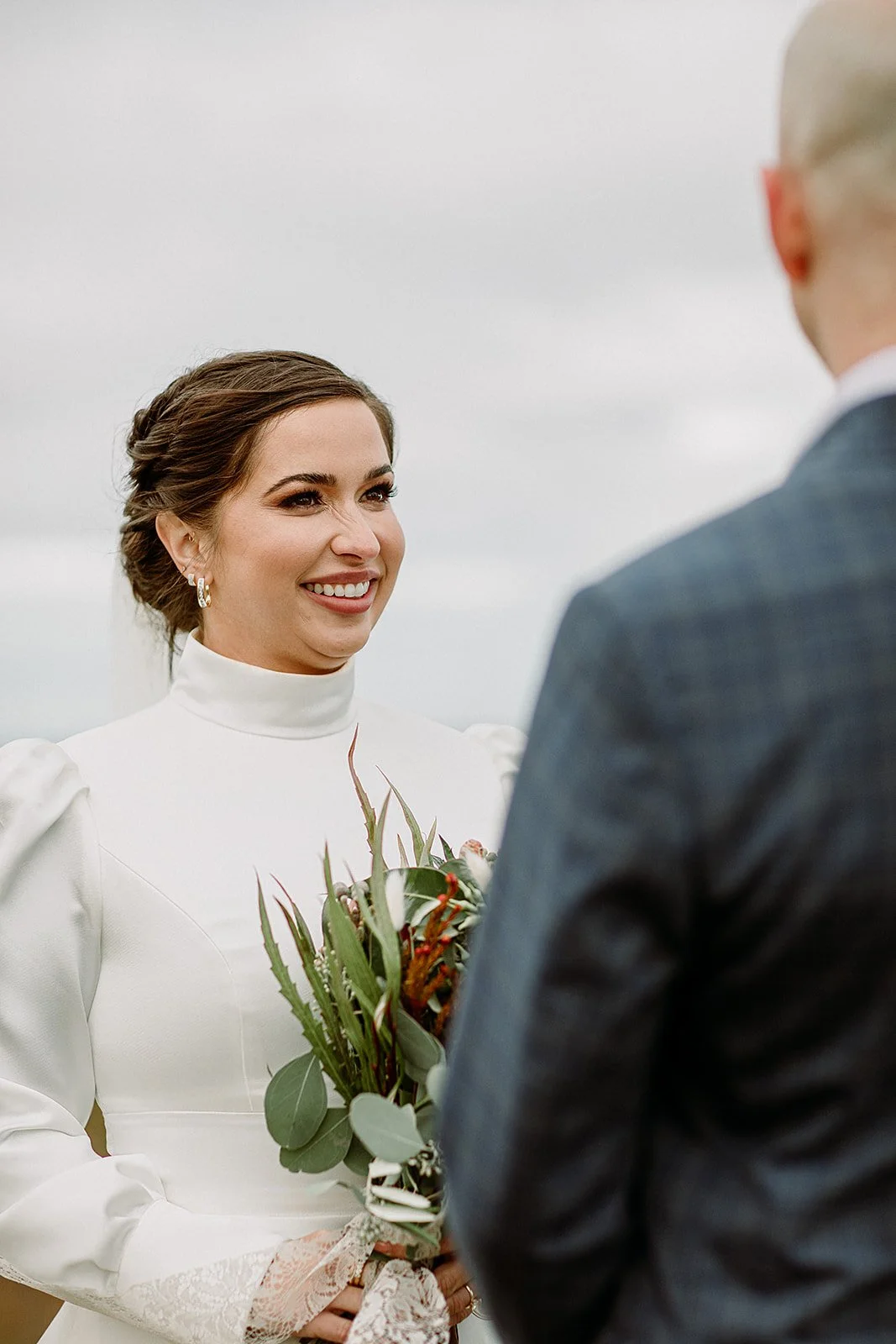 A Private Multi-Area Iceland Elopement by Steph Zakas Photography with wedding couple at private secluded ceremony