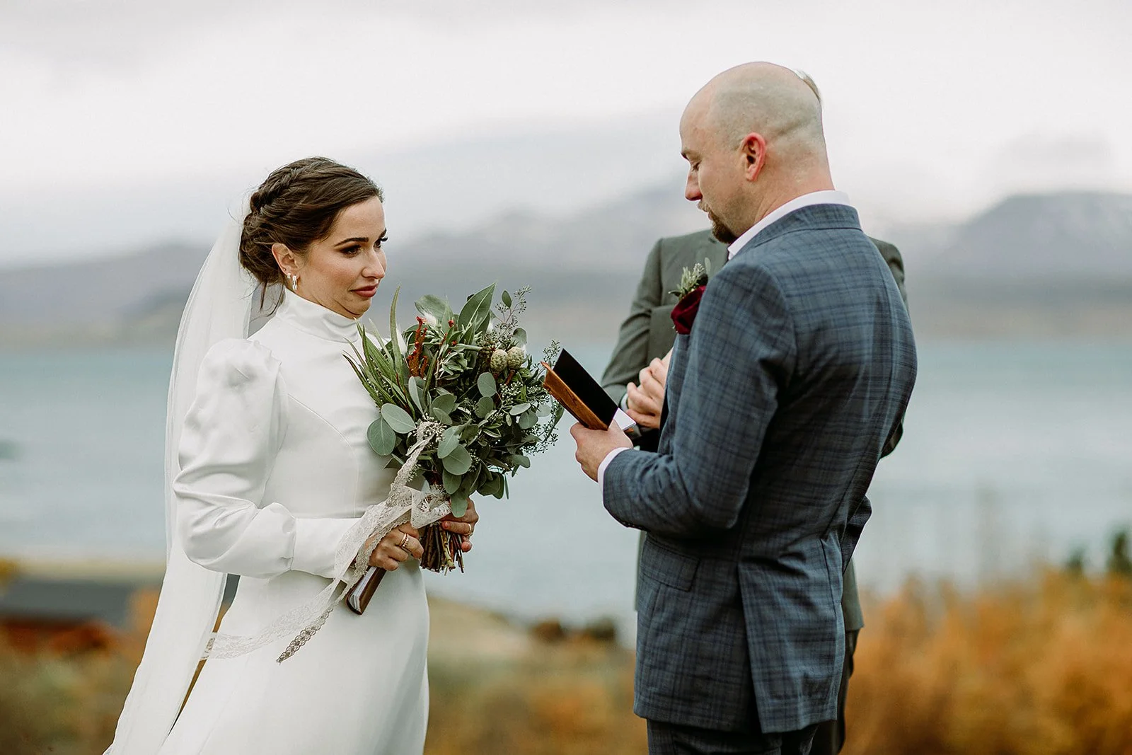A Private Multi-Area Iceland Elopement by Steph Zakas Photography with wedding couple at private secluded ceremony