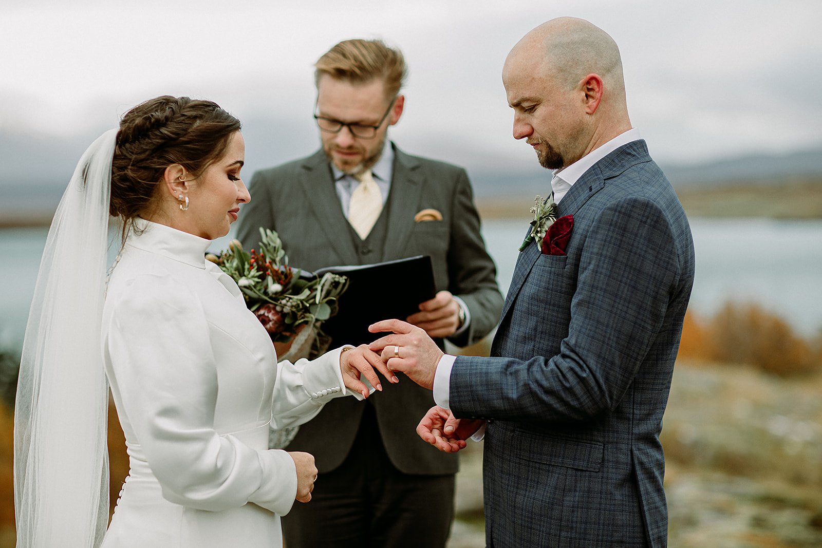 A Private Multi-Area Iceland Elopement by Steph Zakas Photography with wedding couple at private secluded ceremony