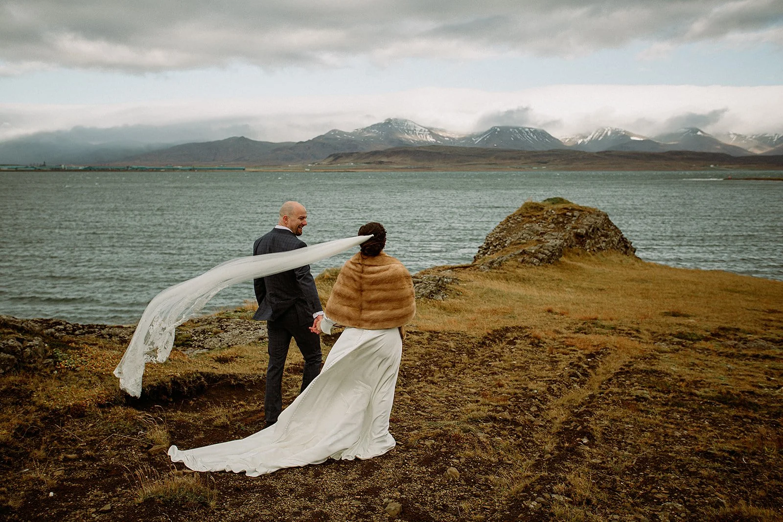 A Private Multi-Area Iceland Elopement by Steph Zakas Photography with wedding couple at private secluded ceremony